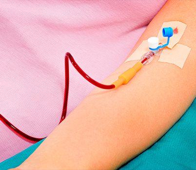 person receiving a blood transfusion